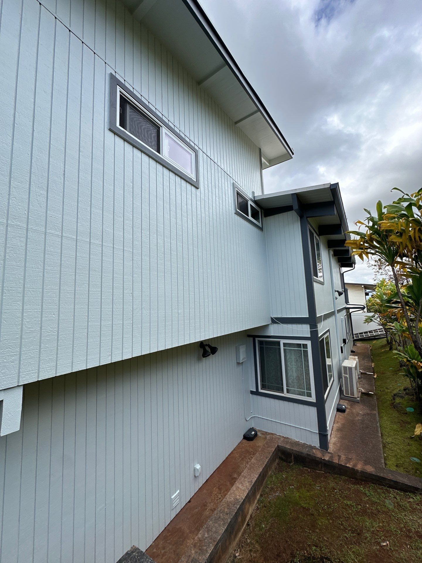 Residential home exterior repaint by Kapili Roofing & Painting in Ewa Beach